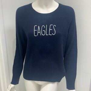 100% cashmere. Never Been worn cashmere crew in navy with eagles embroidery